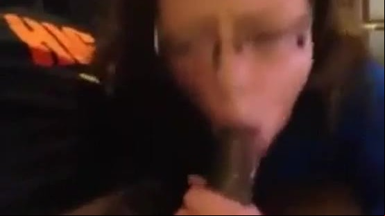 Sexy white chick with glasses sucking black dick